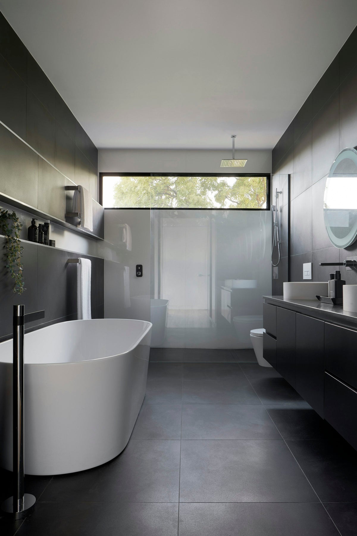 Tasteful upscale bathroom with a clean toilet for “Toilet Shutoff Valve Leaking, Stuck or Won’t Close”