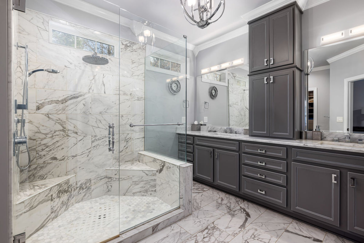 Bathroom with Dark Cabinets and Spacious Shower — featured photo for “Automatic toilet bowl cleaner: tank drop-in vs overflow clip”
