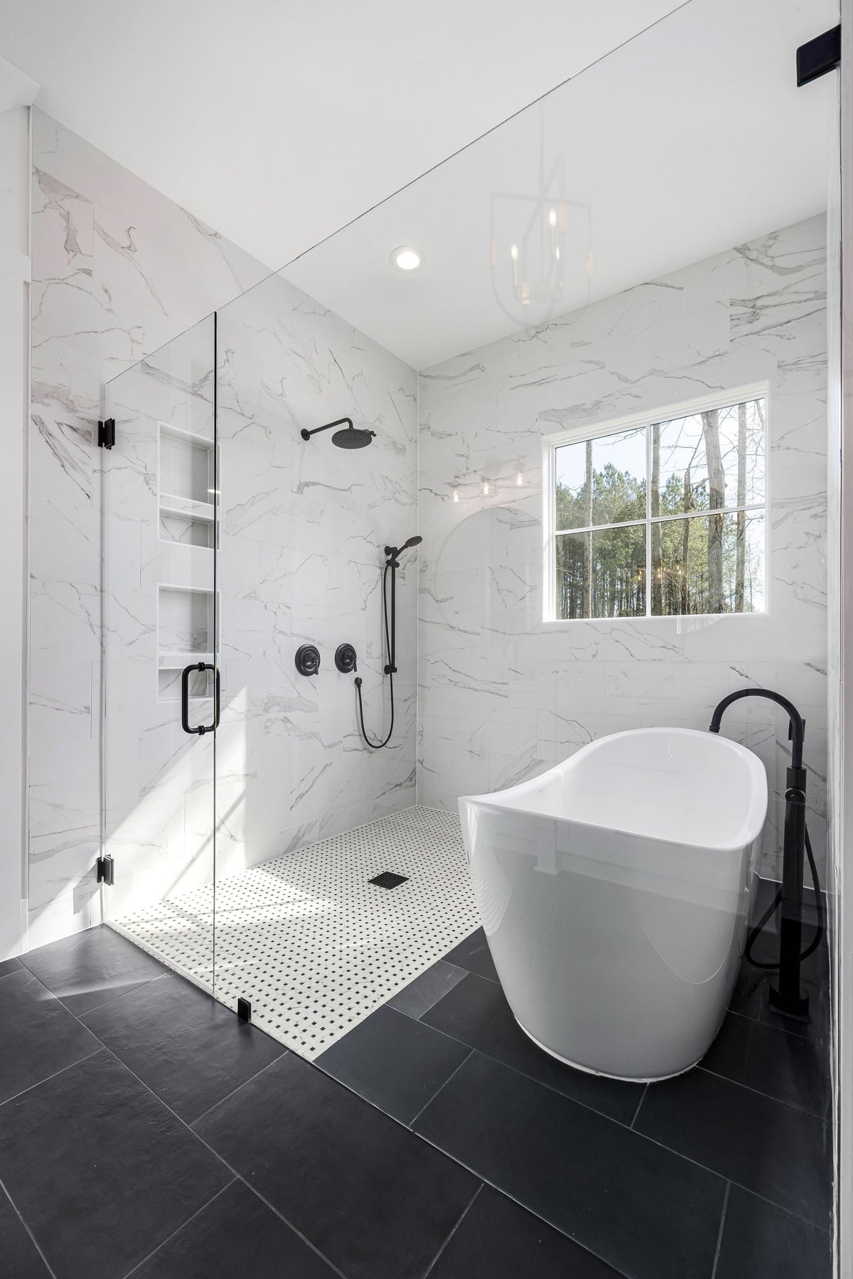 Luxurious Modern Bathroom with Freestanding Tub — featured photo for “How to Replace a Toilet Flapper and Choose the Correct Size”