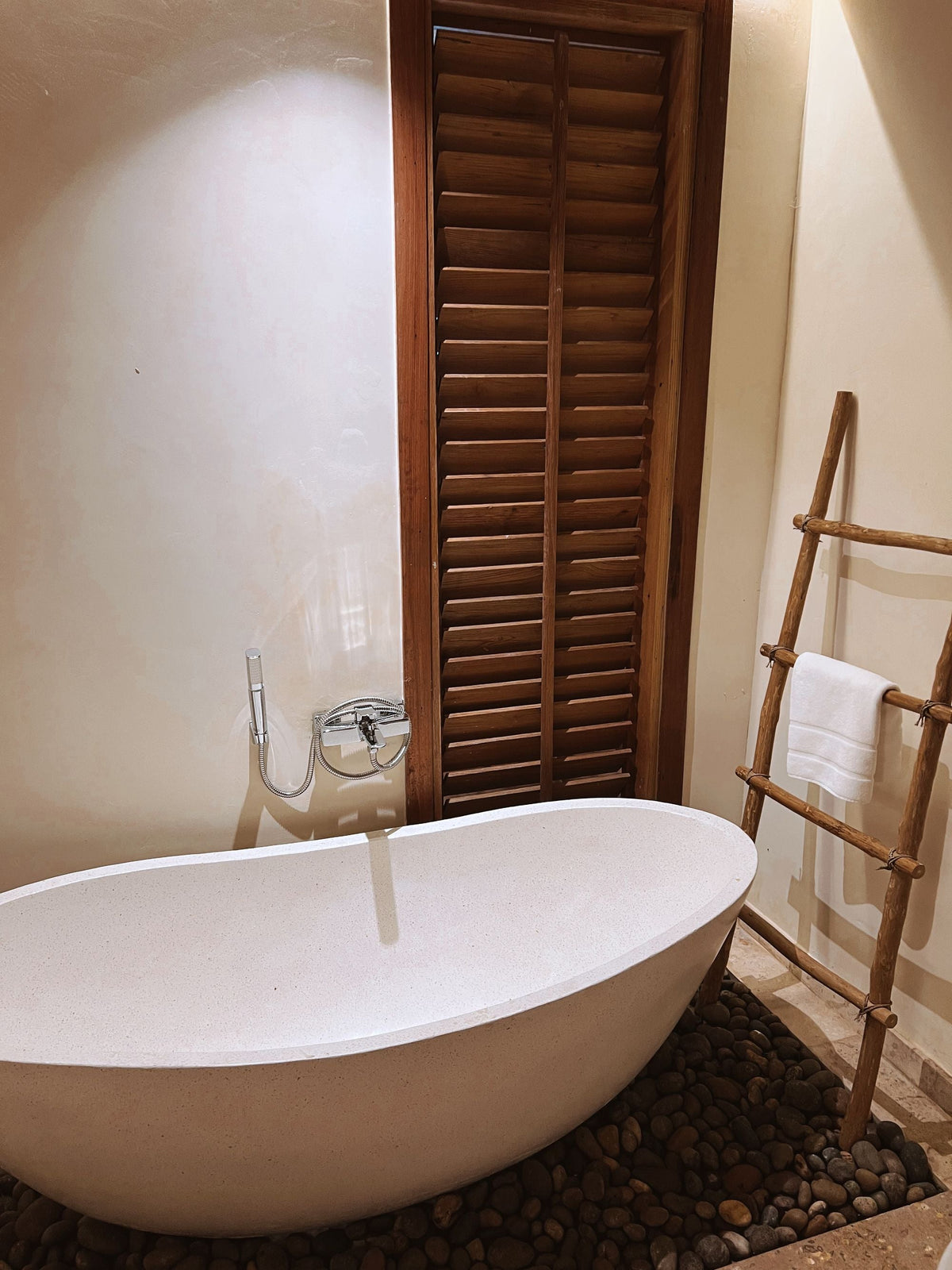 Elegant Spa-like Bathroom with Freestanding Tub — featured photo for “Pipes Bang or Rattle After the Toilet Flushes”